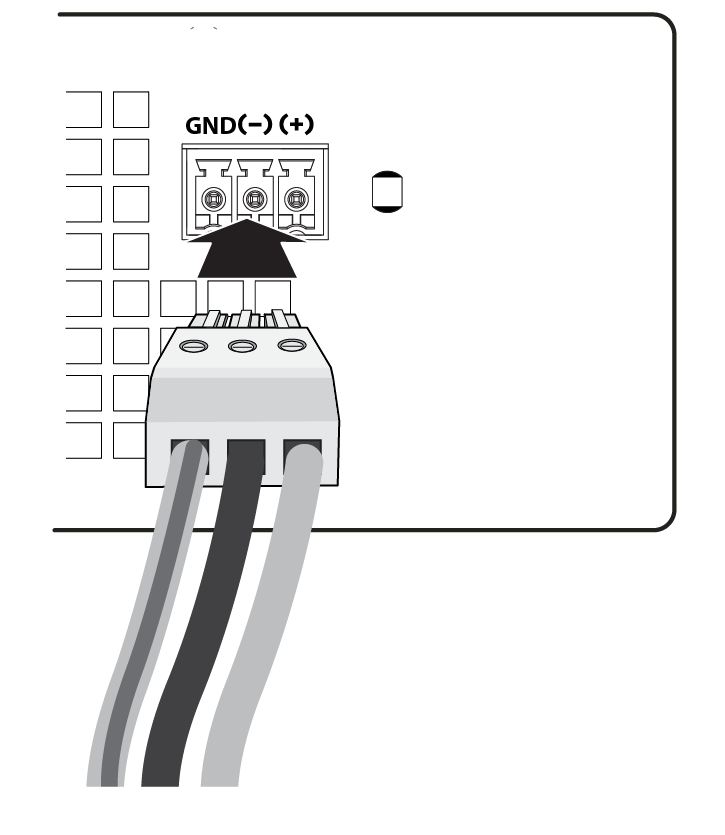 Inserting the DC terminal connector into the slot on the power supply